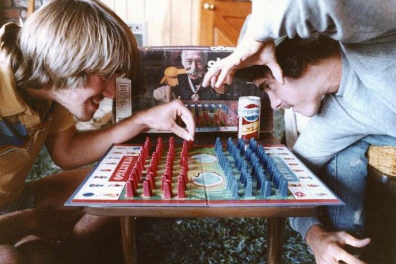 two friends playing a board game