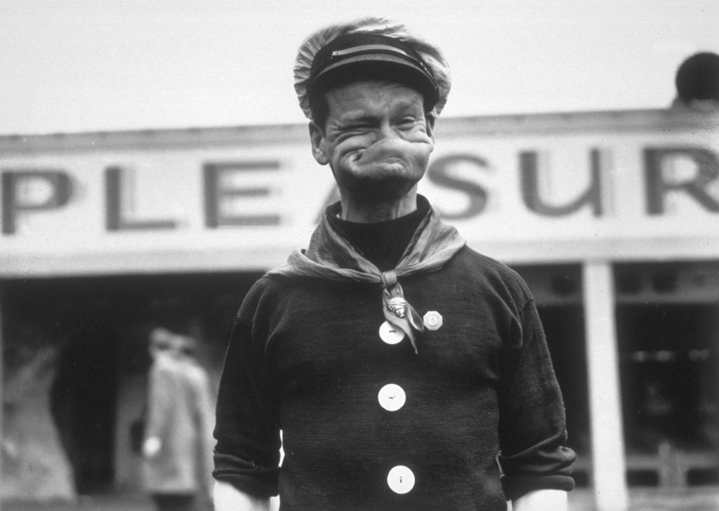 photograph of someone making a face like popeye