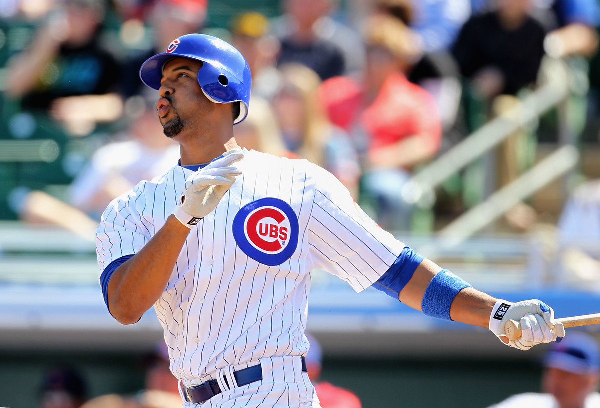 Derrek Lee #25 of the Chicago Cubs hits a solo home run against the Oakland Athletics
