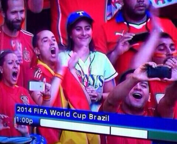 a baseball fan at a world cup game
