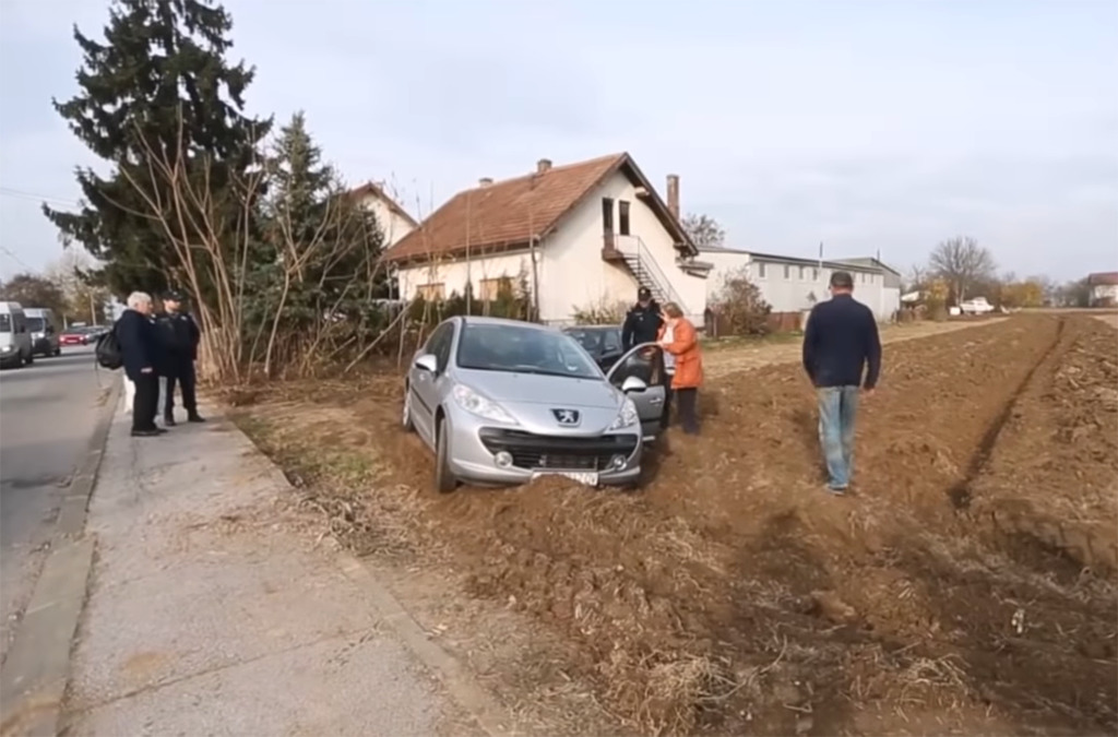 Police getting into car 