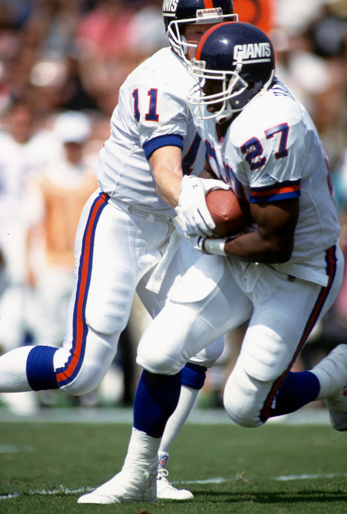 Who was the New York Giants head coach in the 90s?