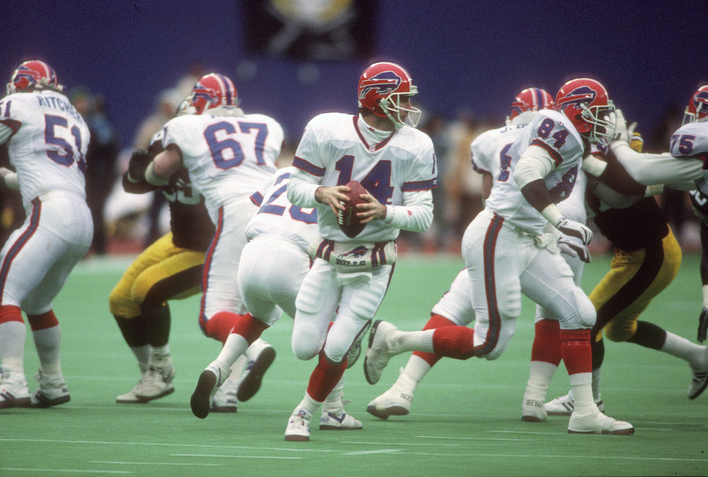 Who was the Buffalo Bills head coach in 1990?