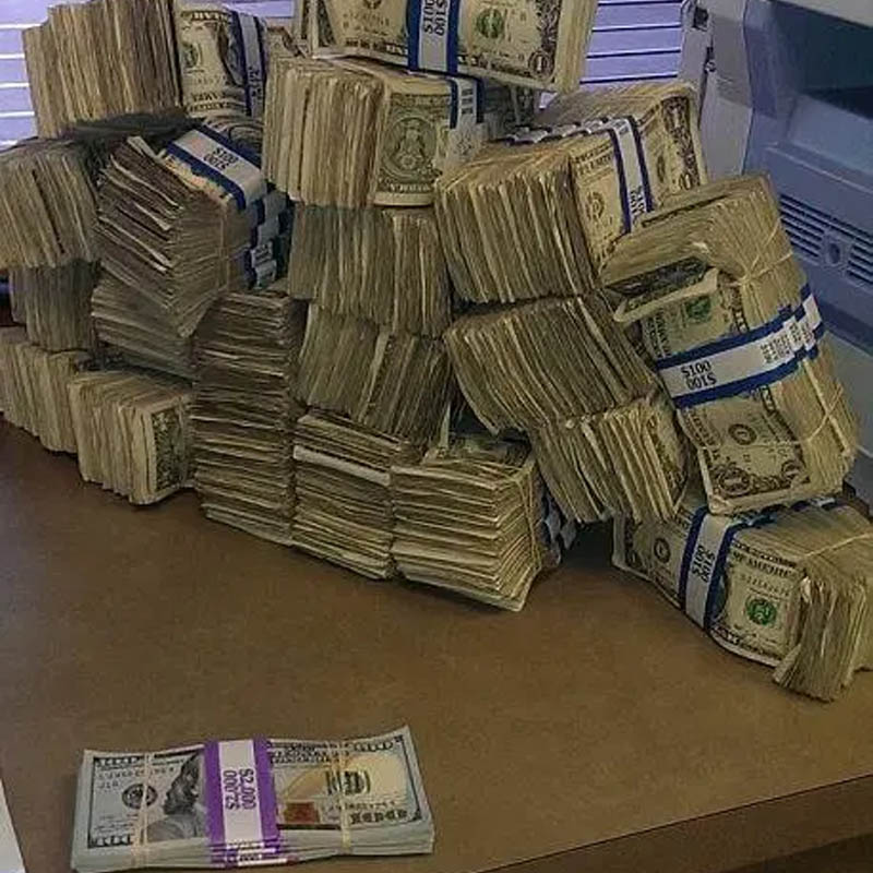 100 bills next to each other 