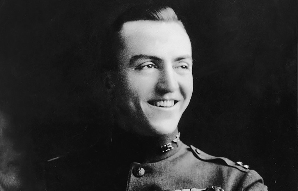 Posing in his military uniform 