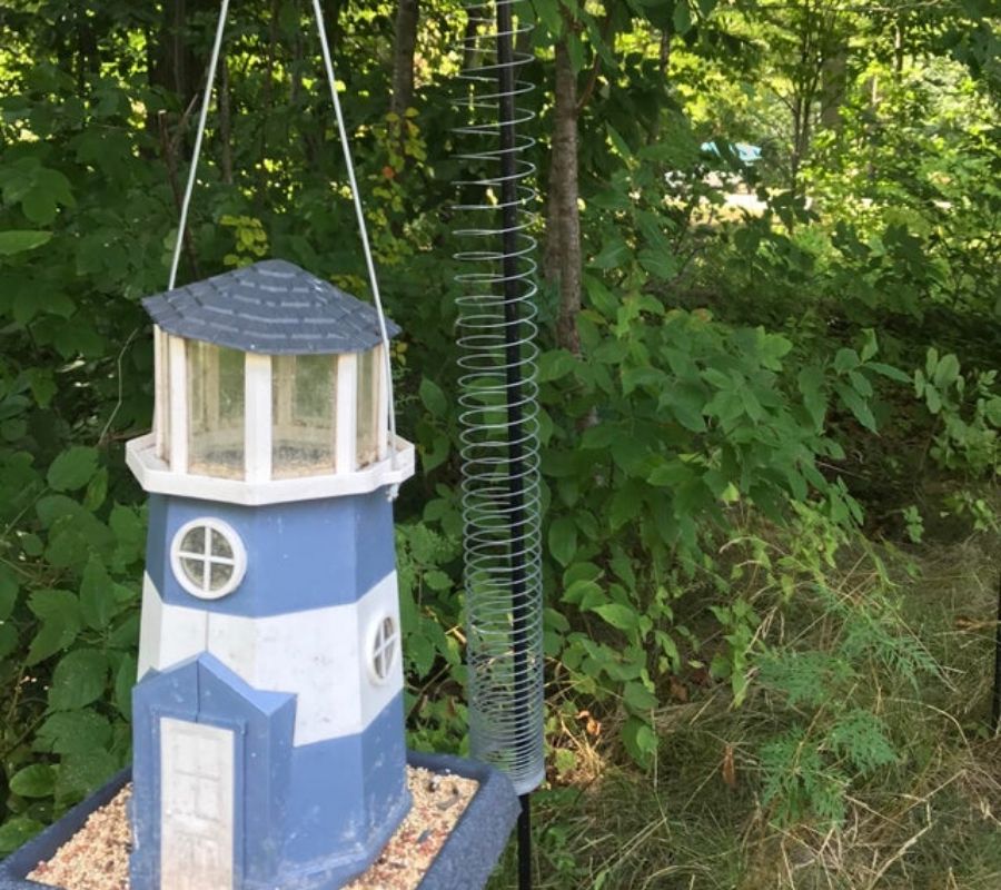 slinky used to keep squirrels off a bird feeder