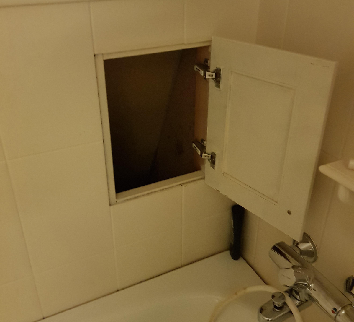 A laundry chute in the second-floor bathroom leads to the laundry room on the first floor.