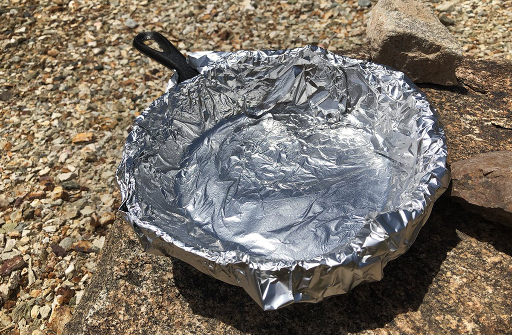Skillet wrapped in aluminum foil 