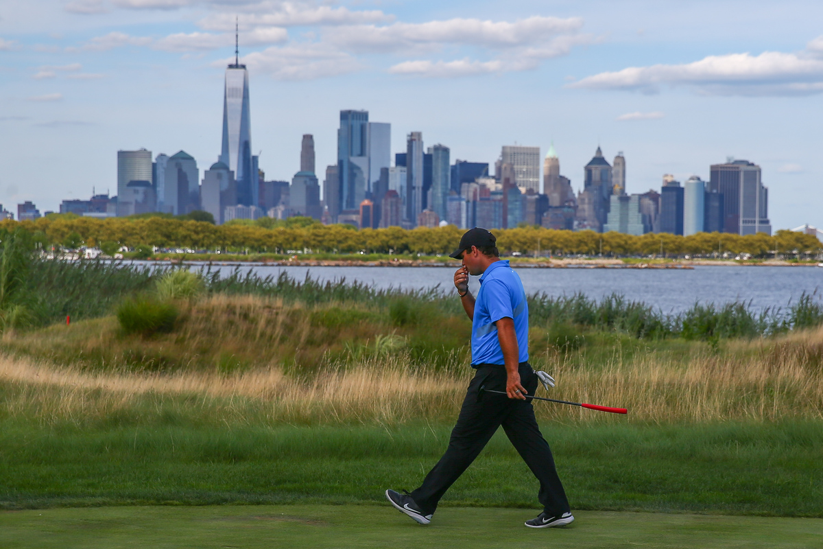 Patrick Reed walks down the 14th fairway at Liberty National Golf Club in Jersey City, NJ. 