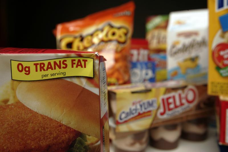 Food packages labeled with trans fats are shown.