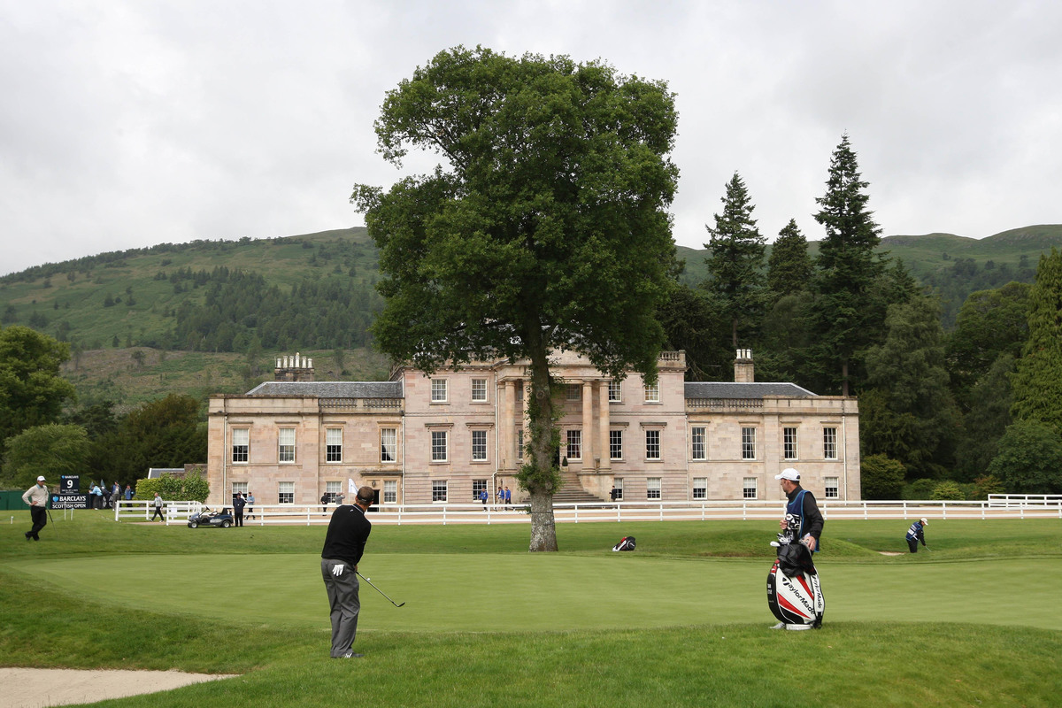 England's Sam Little plays a shot in front of Rossdhu House at Loch Lomond Golf Club