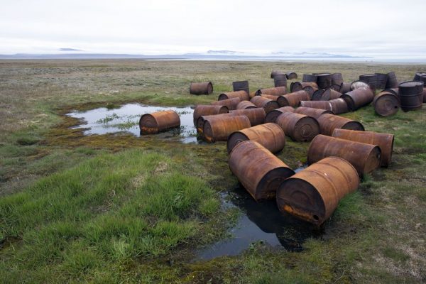 Barrels of petrol abandoned by the Russian army after the cold war. (Photo by Sylvain CORDIER/Gamma-Rapho via Getty Images)