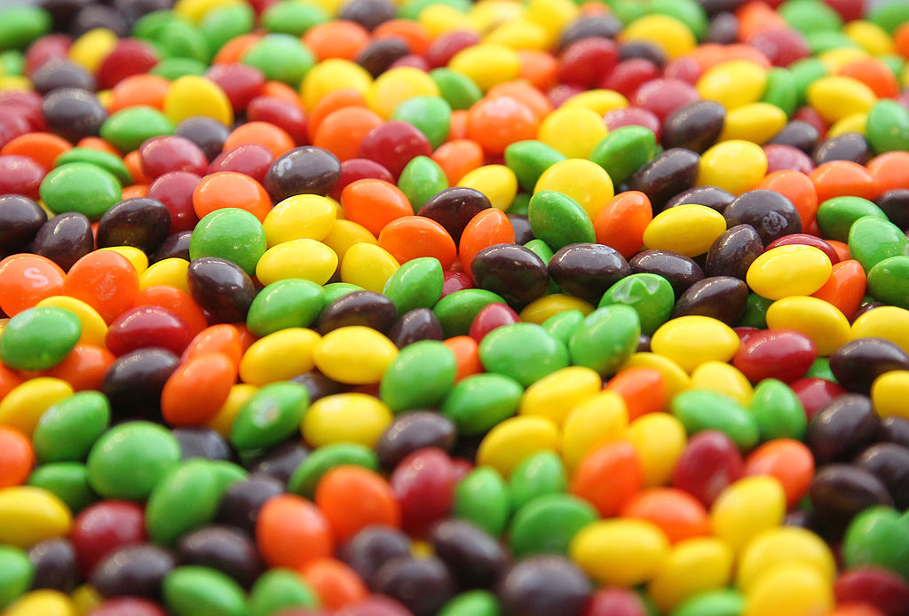 a close-up of a bowl of skittles