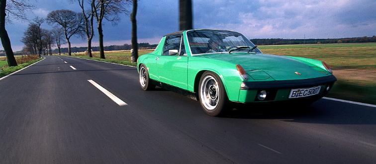 Green car on the road 