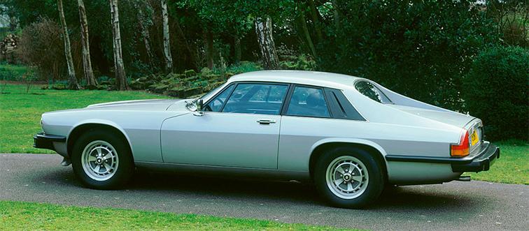 a light blue car on the road