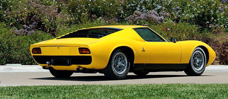 yellow car in driveway