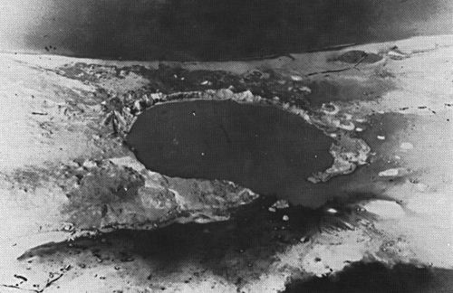 The crater created by detonation on May 5, 1958 (Operation Hardtack I, Cactus test). The site was later used to store nuclear waste
