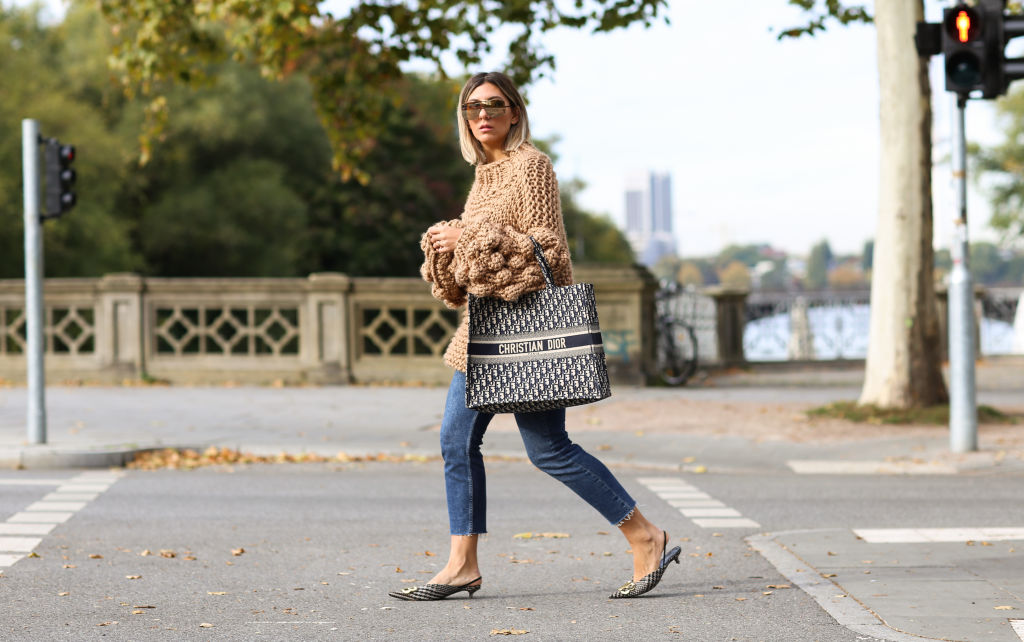 woman with christian dior bag 