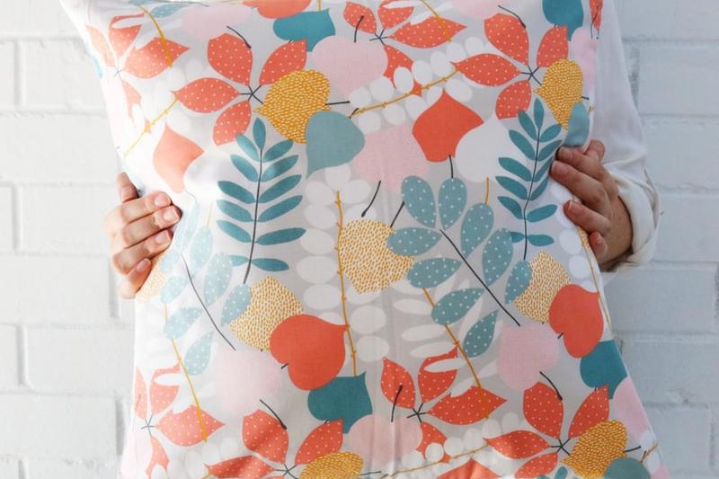 woman holding a pillow 