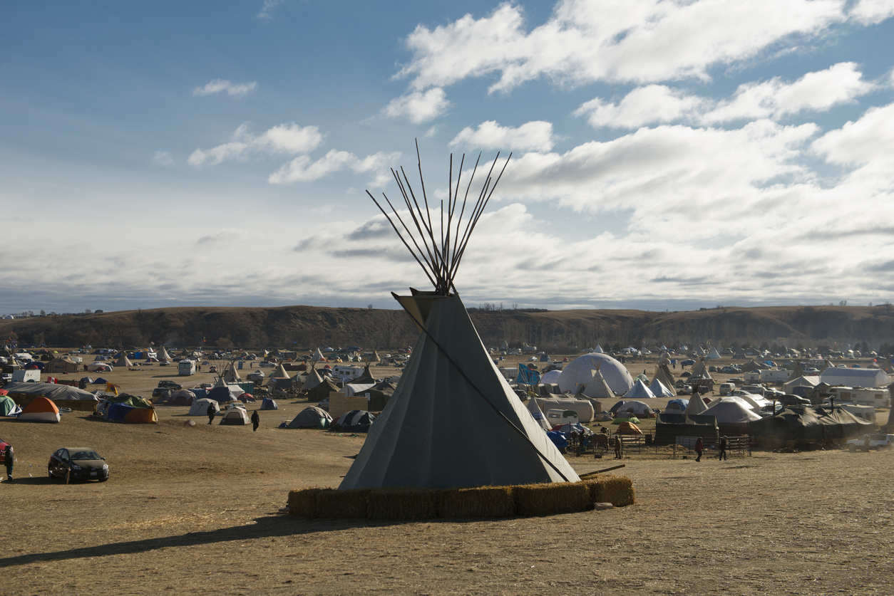 Cannon Ball, ND, USA - November 18, 2016: A Teepee overlooking the the Oceti Sakowin Dakota Access Pipeline resistance camp near the Standing Rock Sioux reservation. The Camp numbered in the thousands before temperatures dropped the next day.