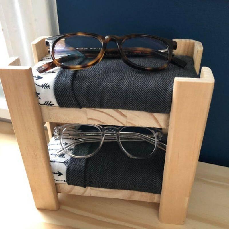someone made a bunch bed for their kid's glasses