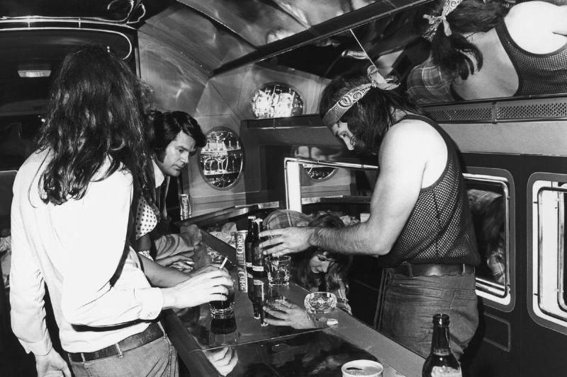 Led Zeppelin band hangs out on the Boeing 720b.