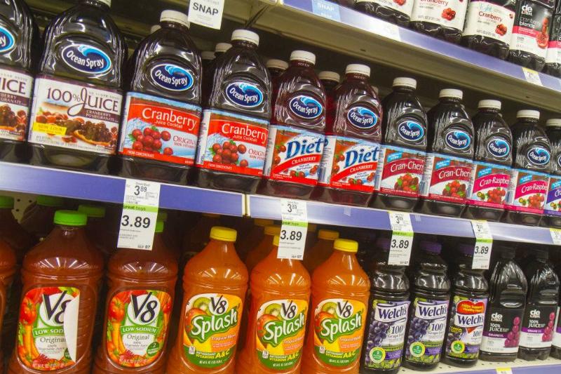 Shelves of juice for sale