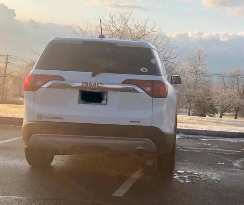 car parked over the lines horribly