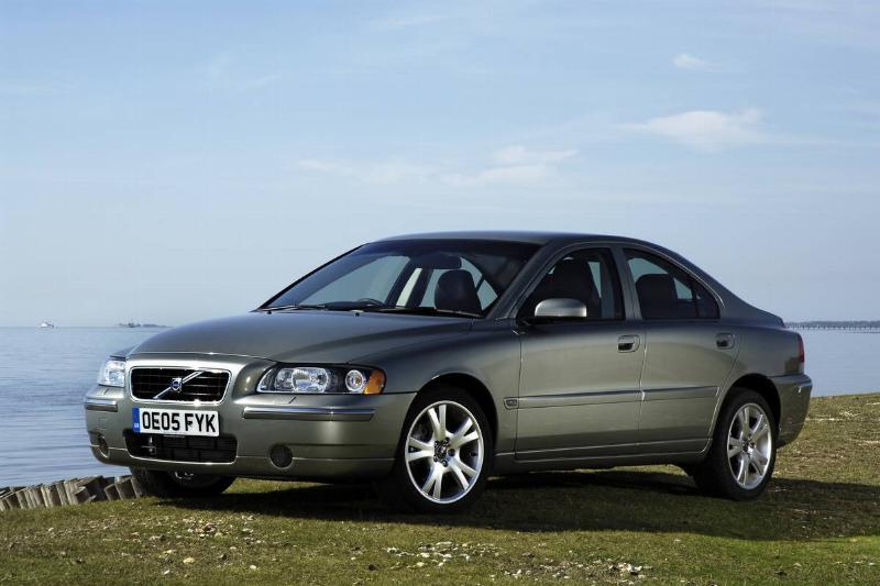 The 2005 Volvo S60 is parked on a cliffside.