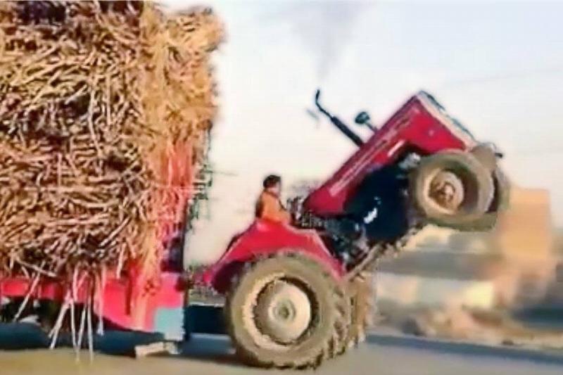 Picture of man doing wheelie 