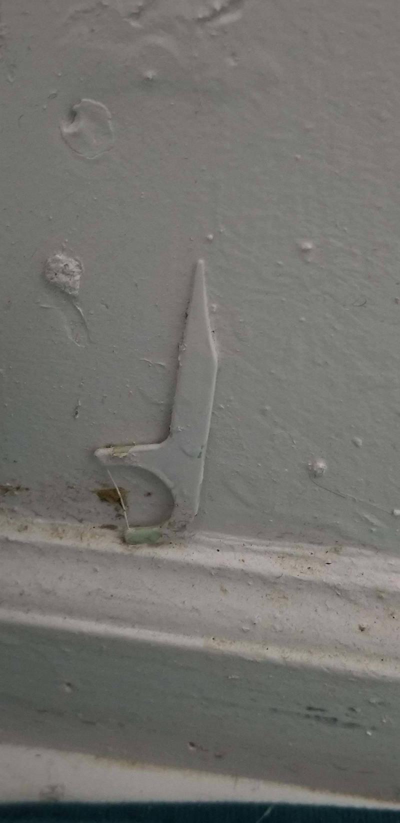 dental floss stick painted onto wall