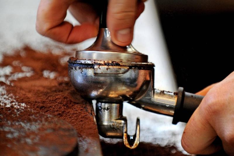 A tamper (C) is used to prepare coffee g