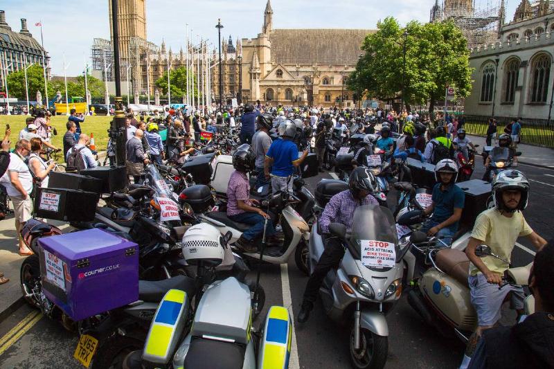 Bikers crowd the streets of London.