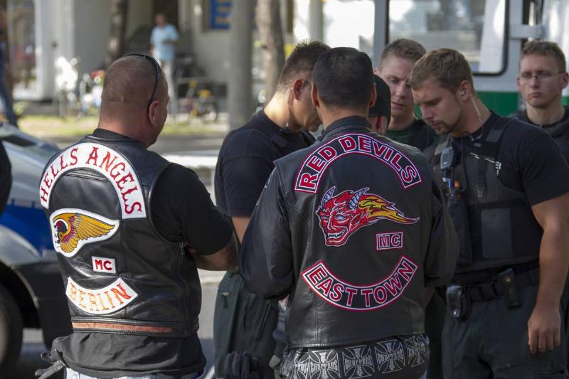Members of the Hells Angels and Red Devils mingle.