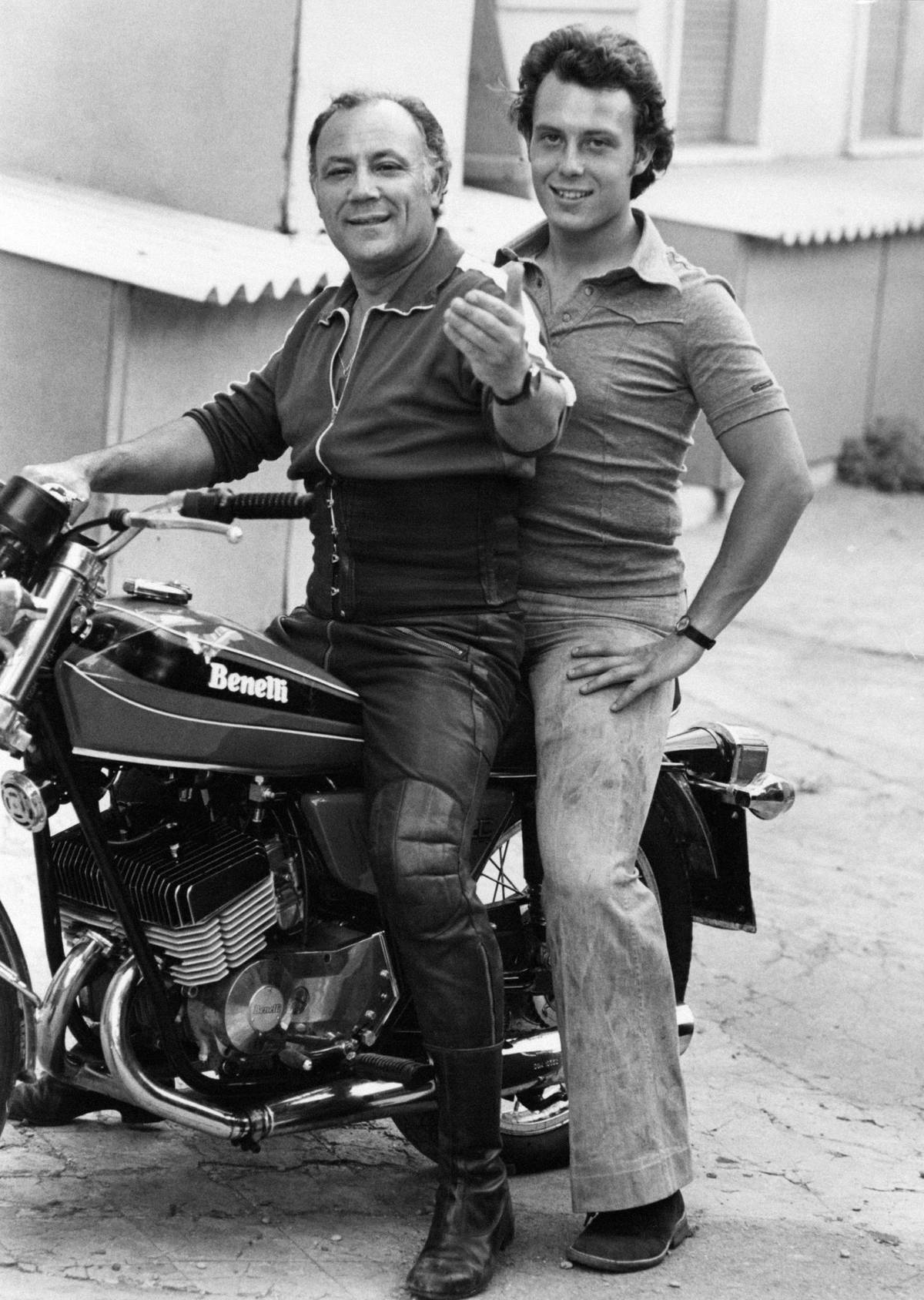 Motorcycle riders give the camera a thumbs up, 1974.