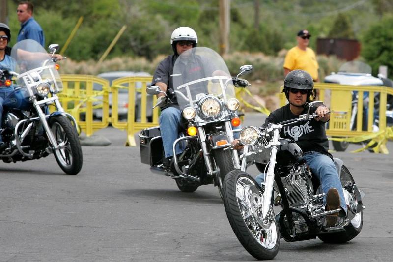 Men drive around on motorcycles.