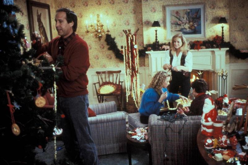 In this still from Christmas Vacation, the Griswold family decorates for Christmas.