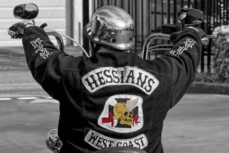 A member of the Hessians rides a motorcycle. 