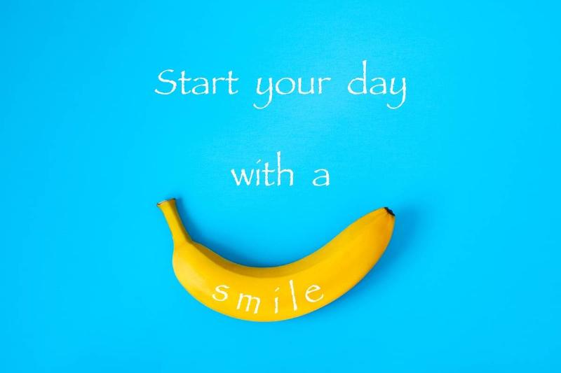 A banana is on a blue background with text that says, 