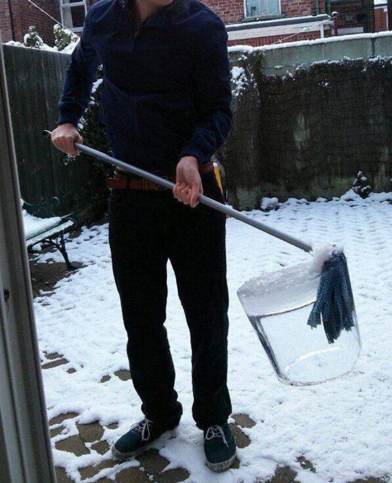 mop encased in solid chunk of ice