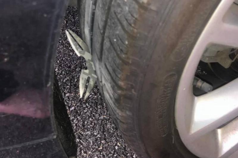 ninja star stuck inside tire of car