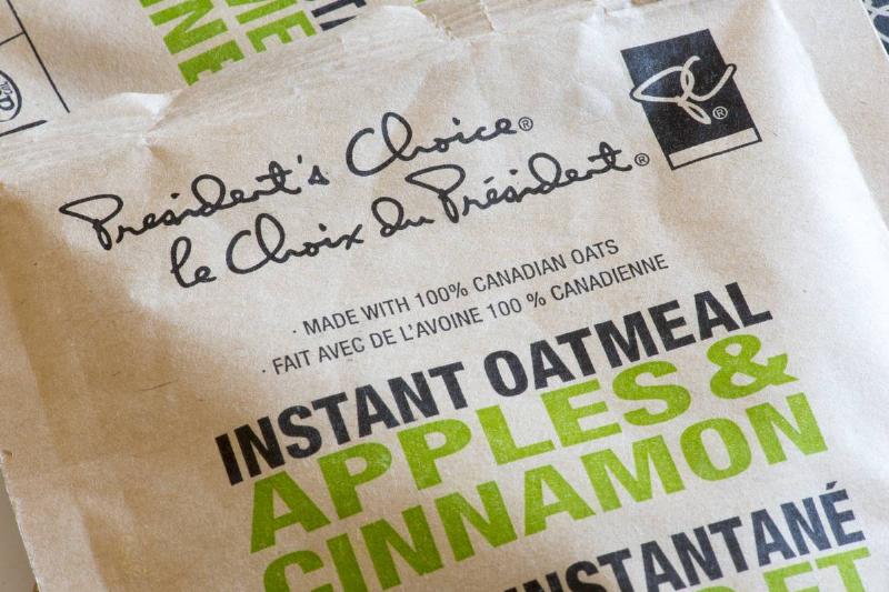A close-up shows an instant packet of apple cinnamon oatmeal.