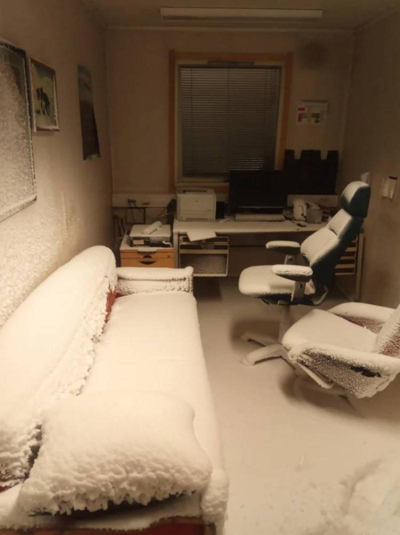 office full of snow on all surfaces