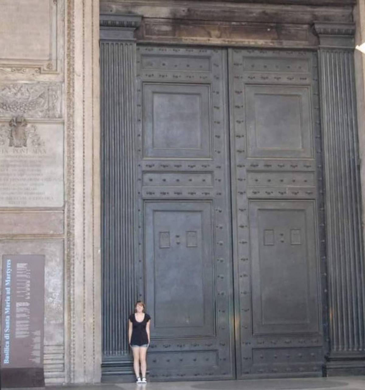Ancient door in Rome that is 25 feet tall and extremely wide