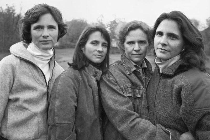 four sisters outside