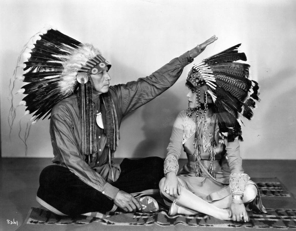 Chief Bigtree performs a traditional ceremony of well wishing on Dorothy Janis