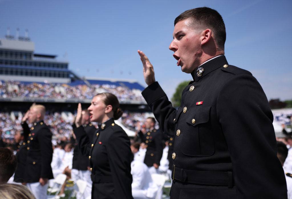 Graduating Midshipman take their commissioning oath
