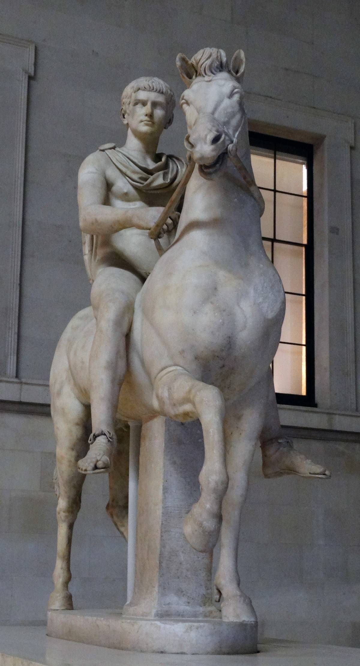 Marble statue of a youth on horseback.