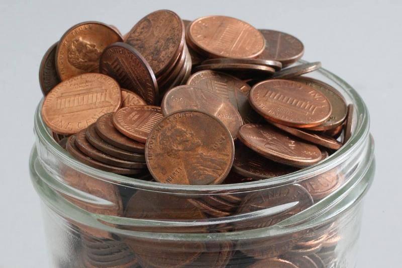 a-jar-of-pennies-is-arranged-for-a-photograph-tuesday-july.-57322