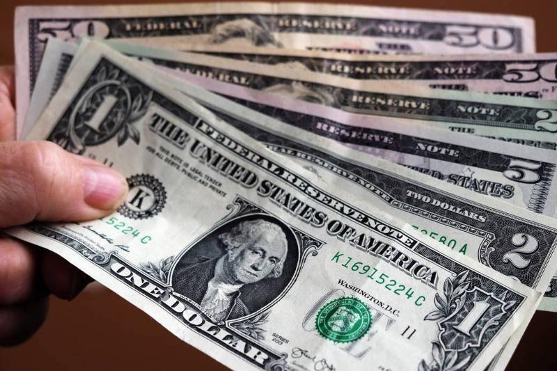 in-this-photo-illustration-a-1-dollar-bill-with-various.-65250